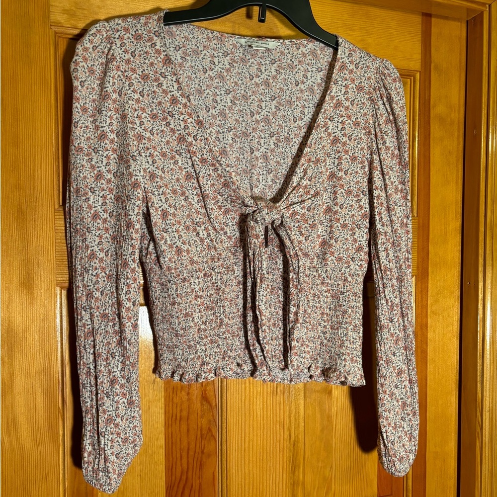 Pink floral adjustable tie, front, long sleeve roughed balloon sleeve top